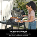 Ninja OG701 7-in-1 Outdoor Electric Grill & Smoker - Grill, BBQ, Air Fry, Bake, Roast, Dehydrate & Broil - Uses Woodfire Pellets - Portable & Weather Resistant