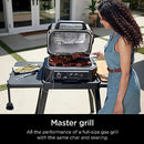 Ninja OG701 7-in-1 Outdoor Electric Grill & Smoker - Grill, BBQ, Air Fry, Bake, Roast, Dehydrate & Broil - Uses Woodfire Pellets - Portable & Weather Resistant